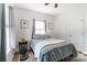 Bright bedroom features lots of natural light, cozy bedding, and modern decor at 314 S Bruns Ave, Charlotte, NC 28208
