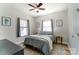 Bright bedroom features lots of natural light, modern decor, and a ceiling fan at 314 S Bruns Ave, Charlotte, NC 28208