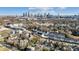 Extensive community featuring modern homes with downtown city skyline in background on a sunny day at 314 S Bruns Ave, Charlotte, NC 28208