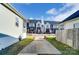 Exterior view of a modern townhome community with manicured lawns on a sunny day at 314 S Bruns Ave, Charlotte, NC 28208