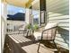 Inviting covered porch with seating and a view of the street showcasing cozy outdoor living at 314 S Bruns Ave, Charlotte, NC 28208