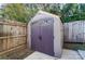 View of a shed surrounded by a fence and trees at 314 S Bruns Ave, Charlotte, NC 28208