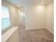 Upstairs hallway with neutral carpet and natural light at 3207 Lisburn St, Charlotte, NC 28227