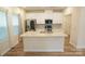 Beautiful kitchen featuring white cabinets, stainless steel appliances, and an island at 3207 Lisburn St, Charlotte, NC 28227