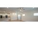 Bright living room open to kitchen with hardwood floors, recessed lighting, and lots of natural light at 3207 Lisburn St, Charlotte, NC 28227