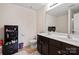 Bathroom featuring double sinks, vanity, and ample storage at 3627 Alexander Forest Dr, Charlotte, NC 28269
