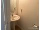 Small half-bathroom with a pedestal sink at 3627 Alexander Forest Dr, Charlotte, NC 28269