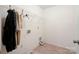 Laundry room with wire shelving, tile flooring, and a utility sink hookup at 3627 Alexander Forest Dr, Charlotte, NC 28269