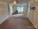Expansive living area with a seamless flow and neutral tones, perfect for entertaining and relaxation at 3627 Alexander Forest Dr, Charlotte, NC 28269