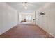 Spacious living room with carpeted flooring at 3627 Alexander Forest Dr, Charlotte, NC 28269