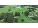 Aerial view features lush green lawns, mature trees, and several homes with picturesque surroundings at 5622 S Rocky River Rd, Monroe, NC 28112