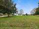 Charming single-story home with a huge grassy yard and a carport in the back at 5622 S Rocky River Rd, Monroe, NC 28112