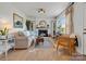 Bright living room with fireplace, hardwood floors, and natural light at 5622 S Rocky River Rd, Monroe, NC 28112