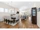 Spacious living room showcases hardwood floors, elegant lighting fixtures, and comfortable seating at 7336 Overjoyed Xing, Charlotte, NC 28215