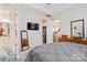 Spacious main bedroom with a walk-in closet, neutral colors, and comfortable furnishings, offering a relaxing retreat at 7336 Overjoyed Xing, Charlotte, NC 28215