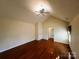 Large bedroom featuring hardwood floors, a ceiling fan, and ample natural light at 7700 Sedgebrook E Dr, Stanley, NC 28164