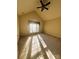 Vaulted ceiling bedroom with a fan, large window, and plush carpeting at 7700 Sedgebrook E Dr, Stanley, NC 28164