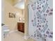 Full bathroom featuring a shower/tub combo with a stylish shower curtain and tile flooring at 808 Wynnshire Dr # A, Hickory, NC 28601
