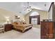 Comfortable bedroom featuring a ceiling fan, a large window, and neutral walls at 808 Wynnshire Dr # A, Hickory, NC 28601