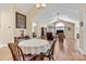 Bright dining room with table and chairs, with an open view to the living area at 808 Wynnshire Dr # A, Hickory, NC 28601