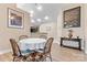 Cozy dining area with a round table, chairs, and view of the kitchen at 808 Wynnshire Dr # A, Hickory, NC 28601