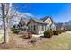 Exterior facade showcasing the home's design and surrounding manicured landscape at 808 Wynnshire Dr # A, Hickory, NC 28601