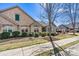 Exterior view of the home showing its stone facade, arched windows and well-kept landscaping at 808 Wynnshire Dr # A, Hickory, NC 28601