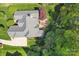 Aerial view of a home with a patio, outdoor seating, firepit and landscaping at 820 Hampshire Hill Rd # 106, Matthews, NC 28105
