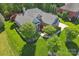 Beautiful home with manicured lawn and lush landscaping at 820 Hampshire Hill Rd # 106, Matthews, NC 28105