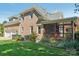 Expansive backyard featuring a screened porch, lush lawn, and well-kept landscaping at 820 Hampshire Hill Rd # 106, Matthews, NC 28105