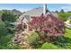 Expansive backyard with lush lawn, patio area, firepit, and a charming screened-in porch at 820 Hampshire Hill Rd # 106, Matthews, NC 28105