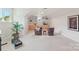 Bright bonus room with built-in shelves and cabinets, ideal for a home gym or versatile living area at 820 Hampshire Hill Rd # 106, Matthews, NC 28105