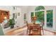 Sunlit dining area boasts large windows overlooking the lush backyard at 820 Hampshire Hill Rd # 106, Matthews, NC 28105
