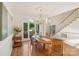Elegant dining room with chandelier and staircase at 820 Hampshire Hill Rd # 106, Matthews, NC 28105