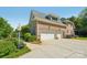 Spacious three-car garage with ample parking and well-maintained surroundings at 820 Hampshire Hill Rd # 106, Matthews, NC 28105