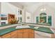 Kitchen boasts an eat-in breakfast nook with seamless countertop and sink at 820 Hampshire Hill Rd # 106, Matthews, NC 28105