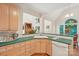 Open kitchen design features updated appliances, sink, and dishwasher at 820 Hampshire Hill Rd # 106, Matthews, NC 28105