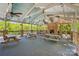 Inviting outdoor space with picnic tables and fireplace perfect for entertaining at 820 Hampshire Hill Rd # 106, Matthews, NC 28105