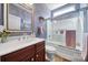Cozy bathroom featuring glass enclosed shower, vanity with sink and tiled floors at 9332 Whistling Straits Dr, Fort Mill, SC 29707