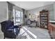 Well-lit home office space with large window, comfortable chair, and functional furnishings at 9332 Whistling Straits Dr, Fort Mill, SC 29707