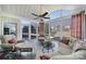 Bright sunroom with vaulted ceiling, large windows, and comfortable seating at 9332 Whistling Straits Dr, Fort Mill, SC 29707