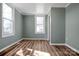 Bright bedroom with natural light, clean lines and modern floors at 97 Central Ave, China Grove, NC 28023