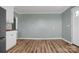 Bright and airy dining room with wood-look flooring and neutral-colored walls at 97 Central Ave, China Grove, NC 28023