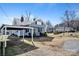 Charming home featuring a covered porch and carport in a quiet neighborhood at 97 Central Ave, China Grove, NC 28023