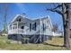 Charming home featuring a covered porch and partial basement at 97 Central Ave, China Grove, NC 28023