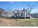 Charming home featuring a covered porch and carport in a quiet neighborhood at 97 Central Ave, China Grove, NC 28023