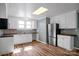 Functional kitchen with modern stainless steel appliances, plenty of counter space and natural light at 97 Central Ave, China Grove, NC 28023