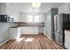 Well-equipped kitchen with modern stainless steel appliances and plenty of counter space at 97 Central Ave, China Grove, NC 28023