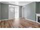 Inviting living room with a fireplace and modern floors at 97 Central Ave, China Grove, NC 28023