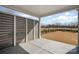 Covered patio with privacy screen, perfect for outdoor dining and relaxation at 1113 Idyllic Ln, Waxhaw, NC 28173